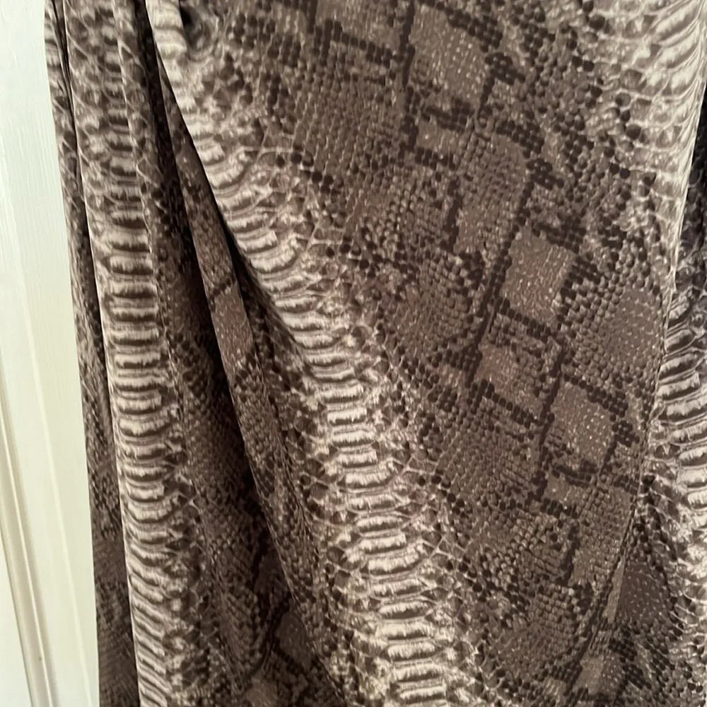 Micheal Kors size XL tan serpent print top ,year round alone or under jacket